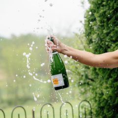 Popping champagne bottle by Seedling and Sage Catering