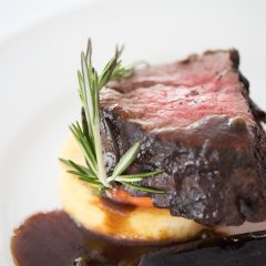 Wedding reception filet mignon entree by Seedling and Sage