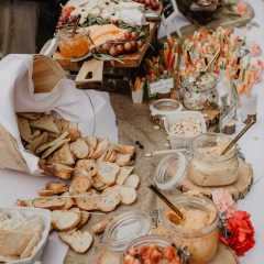 Extravagant cheese and charcuterie display at a wedding by Seedling and Sage Catering
