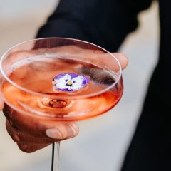 Orange color cocktail at a wedding reception