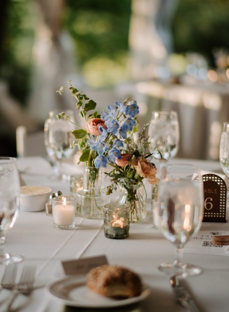 Wedding reception tables under white tent in Philadelphia suburb
