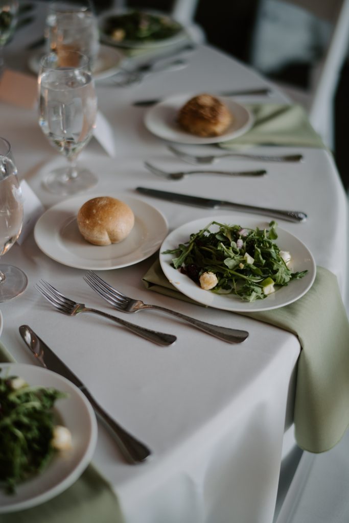Elegant salad course at a wedding reception by Seedling and Sage Catering
