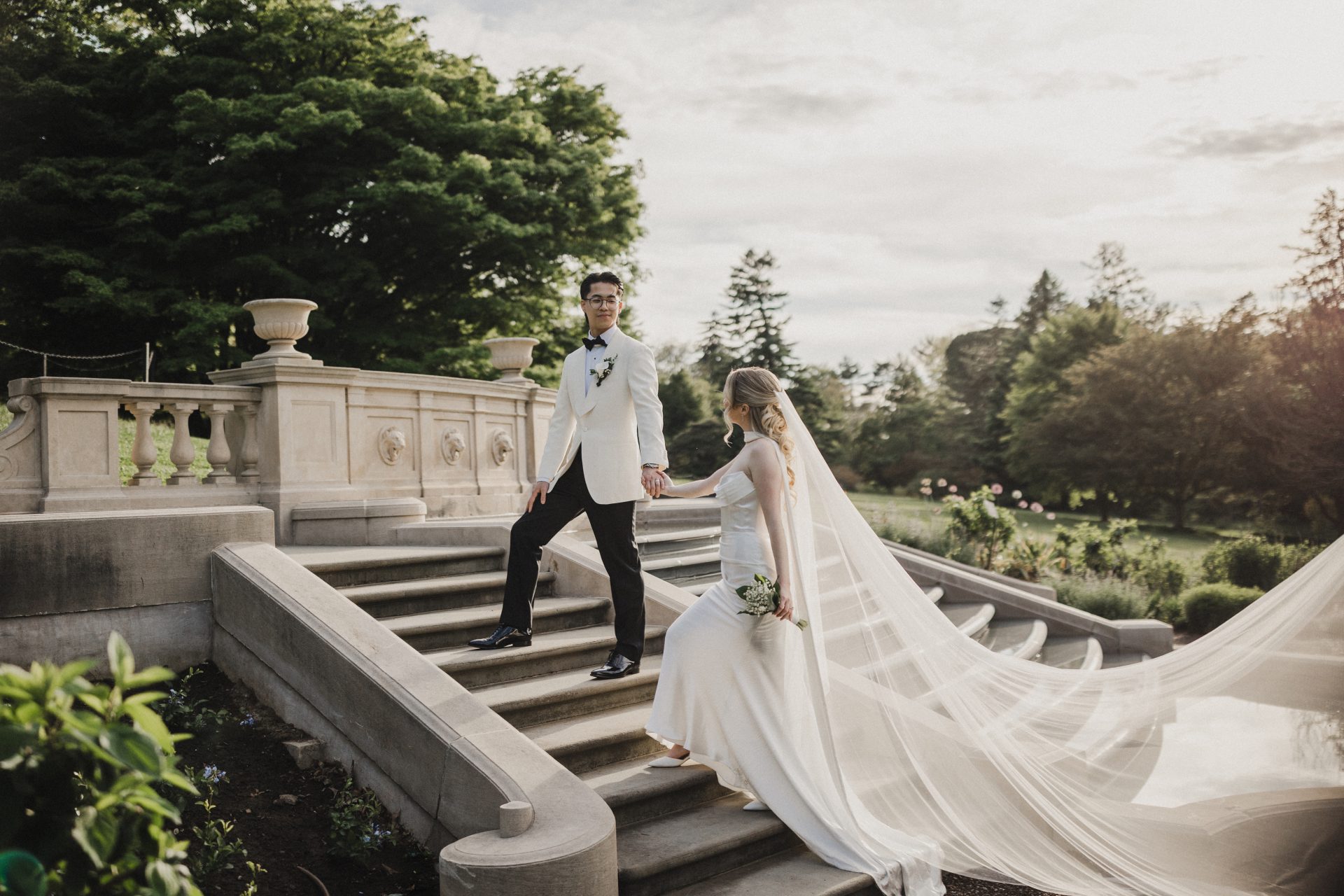 Editorial portrait of bride and groom at Morris Arboretum